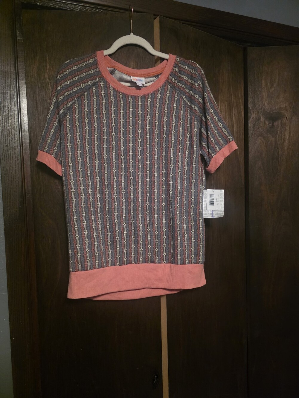LuLaRoe Coral and Navy Patterned Short Sleeve Top